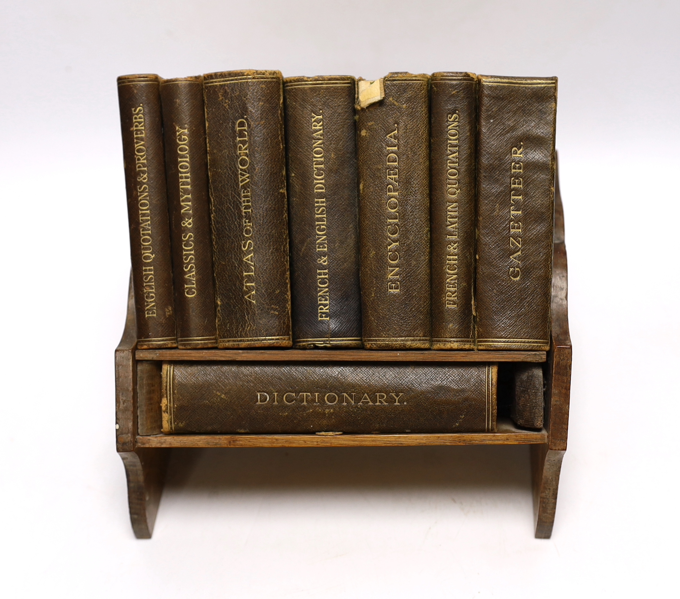 Asprey Reference Library with shelves comprising eight books including Dictionary, French and Latin Quotations and Classics and Mythology